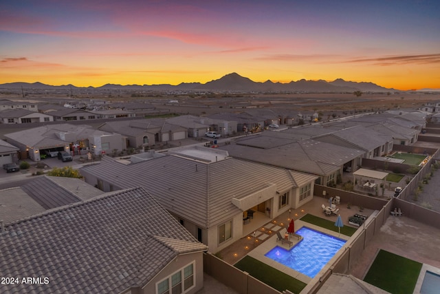 aerial view at dusk with a mountain view