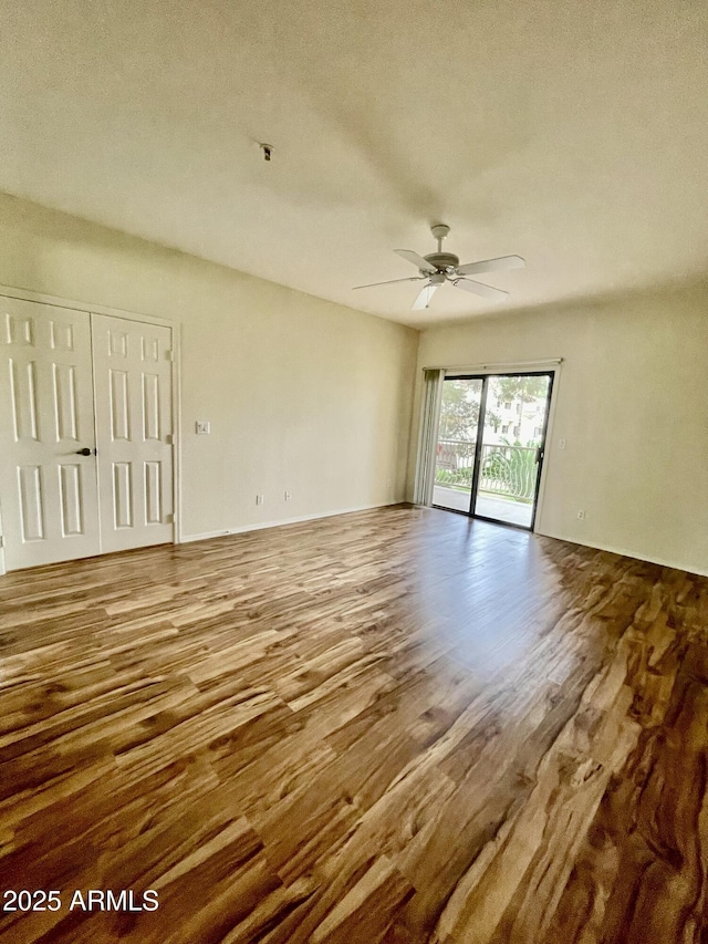 19400 N Westbrook Pkwy Unit 216, Peoria, AZ 85382 - unfurnished room with a ceiling fan and wood finished floors