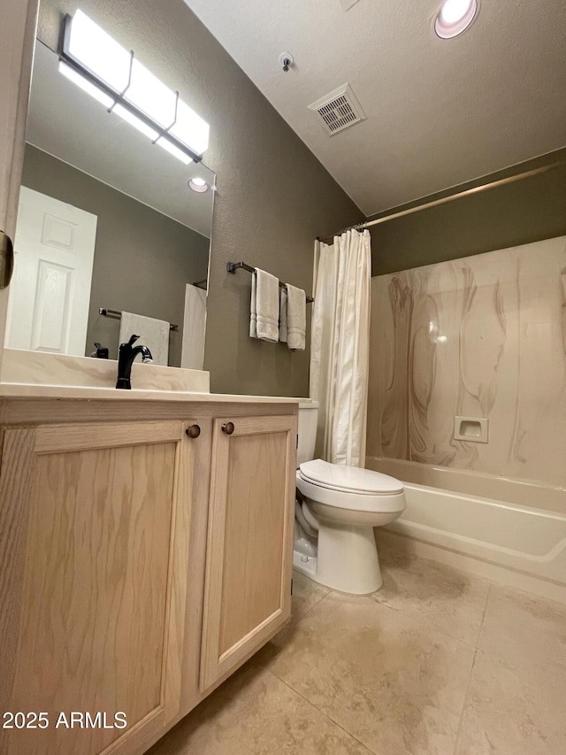 19400 N Westbrook Pkwy Unit 216, Peoria, AZ 85382 - full bath with toilet, visible vents, tile patterned floors, vanity, and shower / bathtub combination with curtain