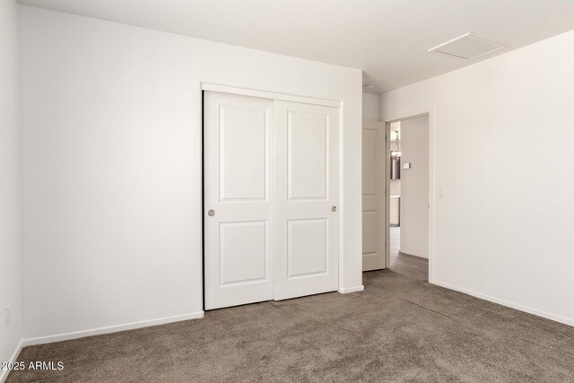 31515 W Buchanan St, Buckeye, AZ 85326 - unfurnished bedroom featuring carpet floors and a closet