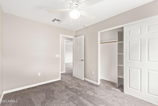 unfurnished bedroom with a ceiling fan, baseboards, visible vents, carpet floors, and a closet