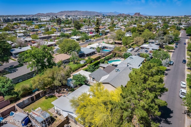 bird's eye view with a residential view and a mountain view