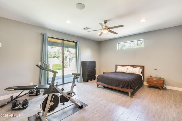bedroom featuring access to exterior, recessed lighting, baseboards, wood finished floors, and visible vents