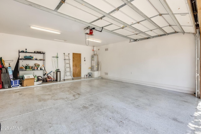 garage featuring a garage door opener and water heater