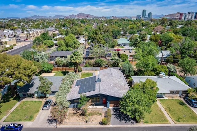 birds eye view of property with a residential view and a mountain view