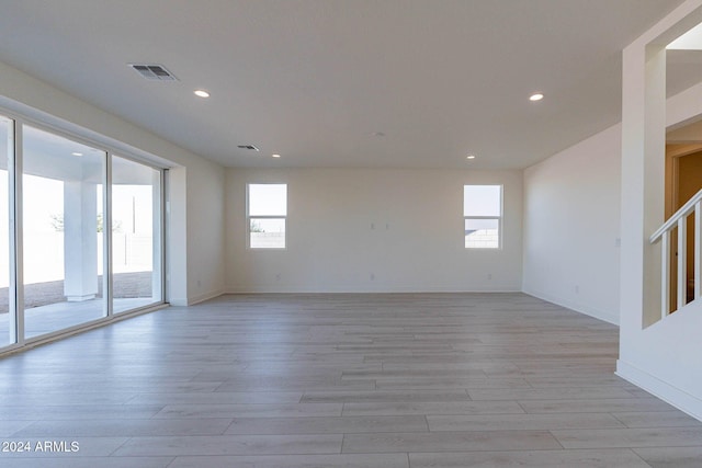 empty room featuring light hardwood / wood-style floors