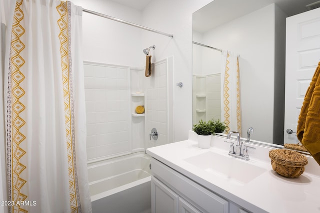 bathroom featuring shower / bathtub combination with curtain and vanity