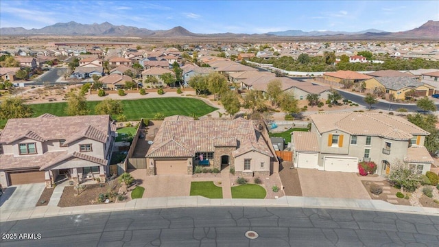 aerial view with a mountain view and a residential view