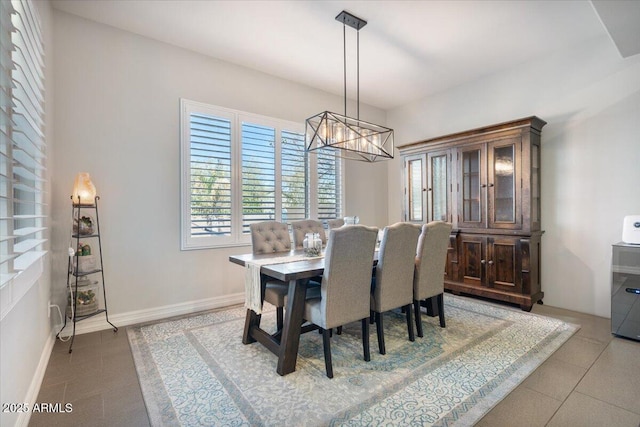 dining room featuring baseboards