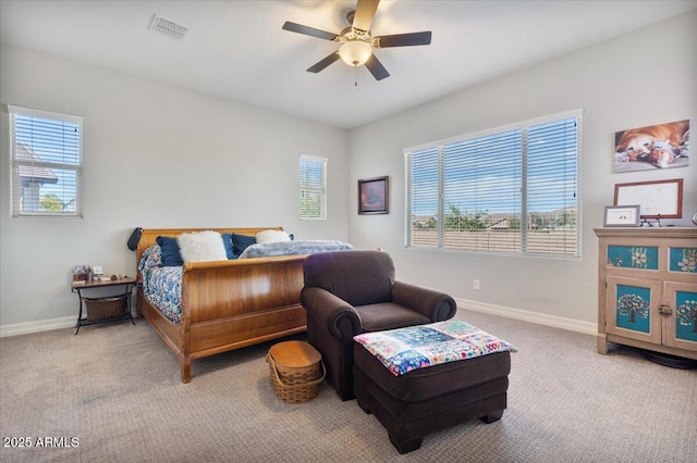 bedroom featuring visible vents, baseboards, and carpet flooring