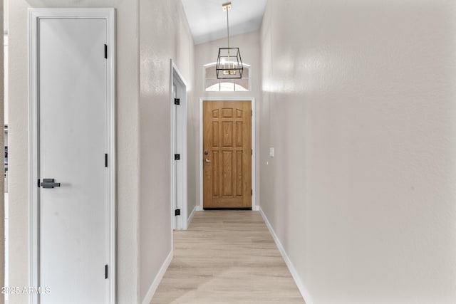 512 W Encinas St, Gilbert, AZ 85233 - entryway featuring light wood-type flooring, baseboards, and a chandelier