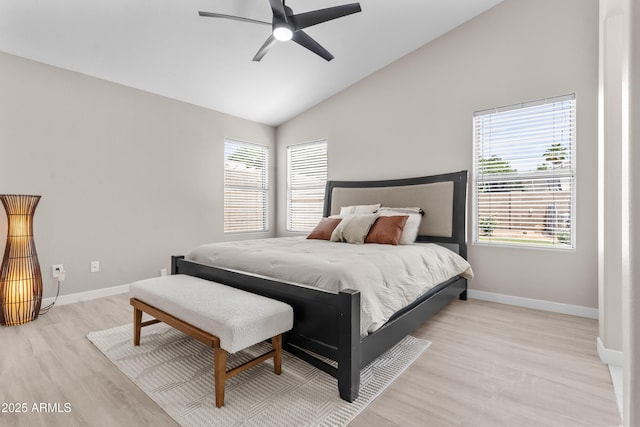 512 W Encinas St, Gilbert, AZ 85233 - bedroom featuring light wood-style flooring, multiple windows, baseboards, and high vaulted ceiling