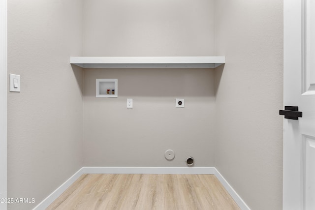 512 W Encinas St, Gilbert, AZ 85233 - laundry room with hookup for a washing machine, light wood-style flooring, hookup for a gas dryer, baseboards, and hookup for an electric dryer