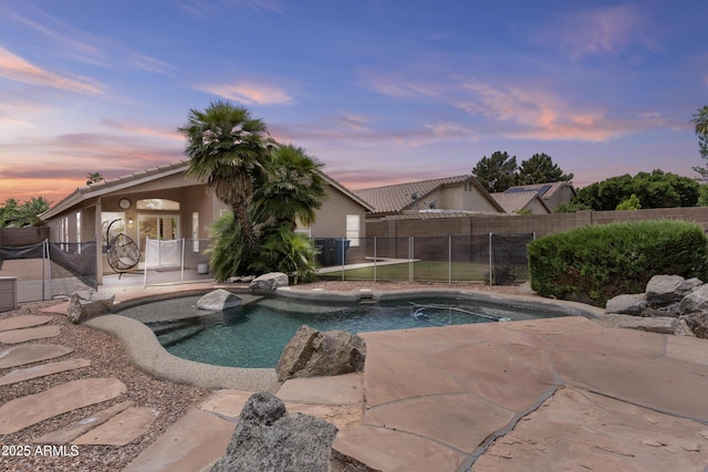 512 W Encinas St, Gilbert, AZ 85233 - pool at dusk featuring a patio area