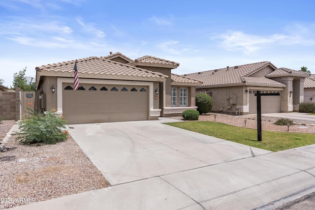 512 W Encinas St, Gilbert, AZ 85233 - mediterranean / spanish-style house with an attached garage, driveway, stucco siding, and a tiled roof