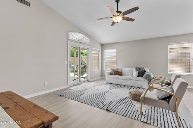 512 W Encinas St, Gilbert, AZ 85233 - living room featuring ceiling fan, baseboards, wood finished floors, and high vaulted ceiling