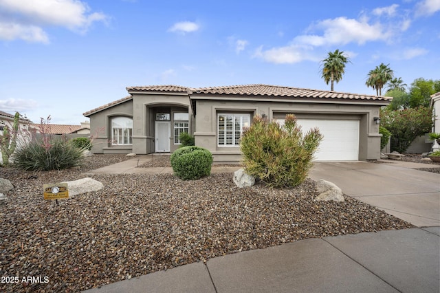 15064 N 54th Way, Scottsdale, AZ 85254 - view of front facade featuring concrete driveway, stucco siding, a tile roof, and a garage
