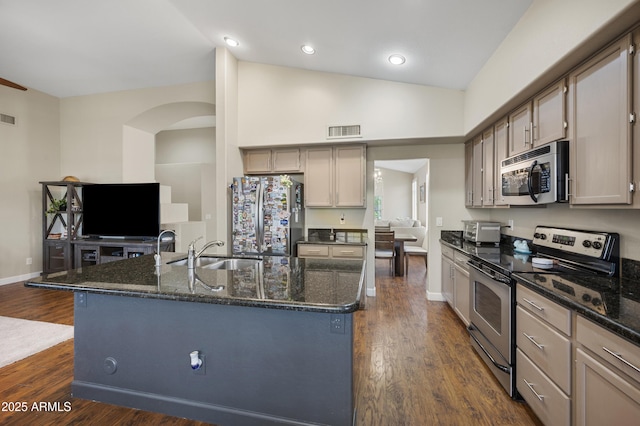 15064 N 54th Way, Scottsdale, AZ 85254 - kitchen with appliances with stainless steel finishes, a sink, dark stone countertops, dark wood-style flooring, and high vaulted ceiling