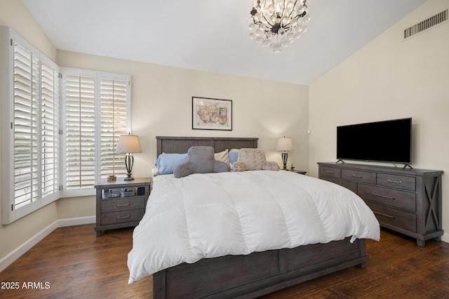 15064 N 54th Way, Scottsdale, AZ 85254 - bedroom with baseboards, dark wood-style floors, a chandelier, and lofted ceiling