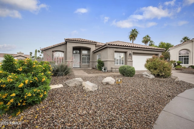 15064 N 54th Way, Scottsdale, AZ 85254 - mediterranean / spanish house with a garage, a tile roof, stucco siding, and concrete driveway