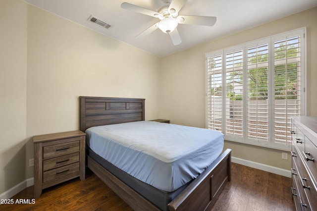 15064 N 54th Way, Scottsdale, AZ 85254 - bedroom with dark wood-style floors, baseboards, and ceiling fan