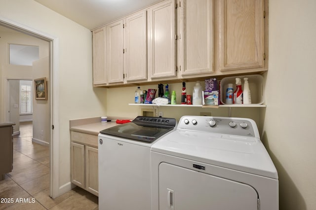 15064 N 54th Way, Scottsdale, AZ 85254 - laundry area featuring washing machine and dryer, light tile patterned floors, cabinet space, and baseboards