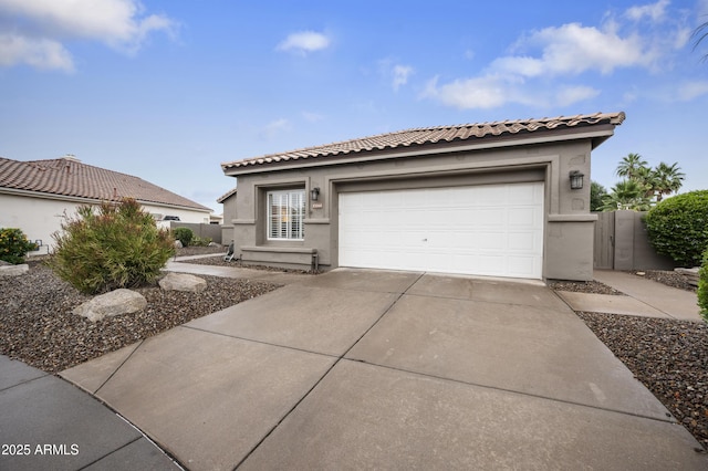 15064 N 54th Way, Scottsdale, AZ 85254 - view of front of house with driveway, stucco siding, a tile roof, and an attached garage