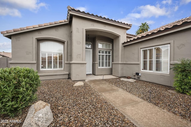 15064 N 54th Way, Scottsdale, AZ 85254 - property entrance with a tile roof and stucco siding