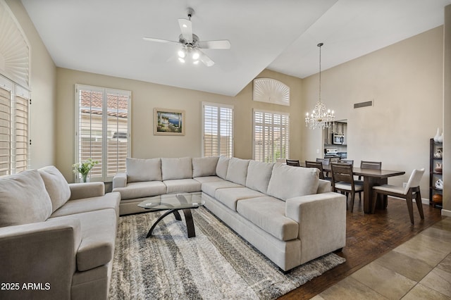 15064 N 54th Way, Scottsdale, AZ 85254 - living room with a ceiling fan, a chandelier, lofted ceiling, baseboards, and wood finished floors