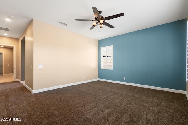 carpeted empty room with ceiling fan