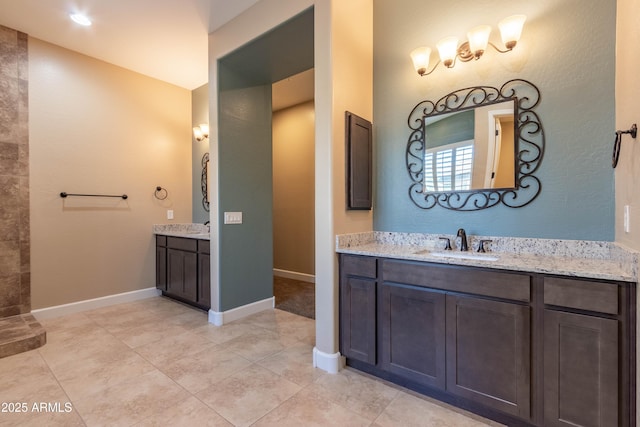 bathroom featuring vanity and tile patterned flooring