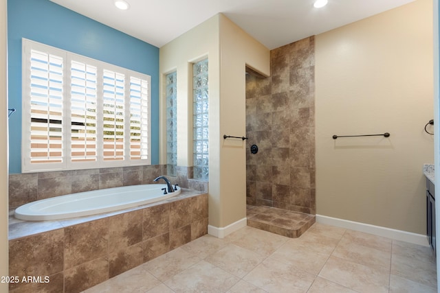 bathroom with tile patterned floors and plus walk in shower