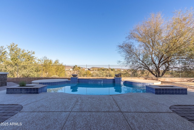 view of pool featuring an in ground hot tub and a patio