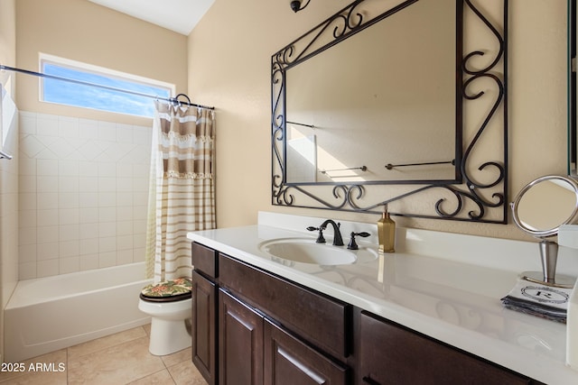 full bathroom with shower / tub combo with curtain, vanity, tile patterned floors, and toilet