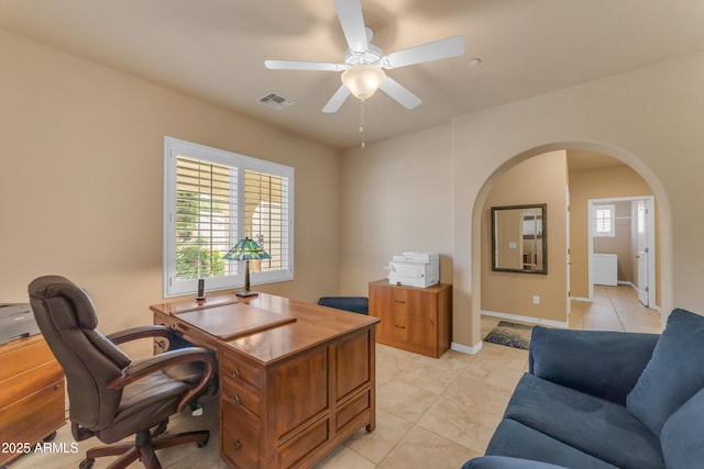 14200 W Village Pkwy Unit 2128, Litchfield Park, AZ 85340 - office featuring arched walkways, ceiling fan, and light tile patterned floors