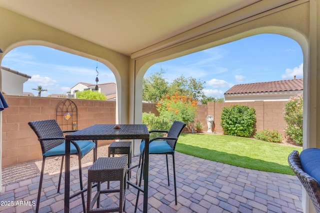 14200 W Village Pkwy Unit 2128, Litchfield Park, AZ 85340 - fenced backyard featuring a patio area and outdoor dining area
