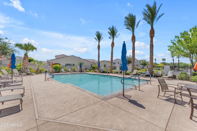 14200 W Village Pkwy Unit 2128, Litchfield Park, AZ 85340 - community pool featuring a patio area and a residential view