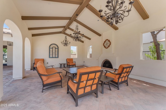 14200 W Village Pkwy Unit 2128, Litchfield Park, AZ 85340 - view of patio / terrace with an outdoor living space with a fireplace