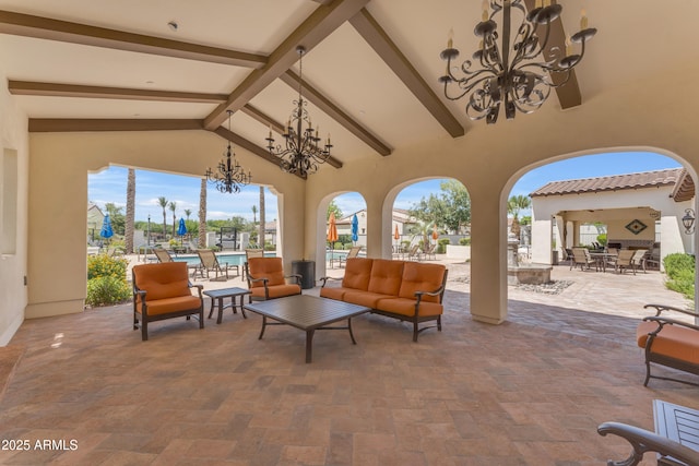14200 W Village Pkwy Unit 2128, Litchfield Park, AZ 85340 - view of patio with an outdoor living space, outdoor dining space, and a community pool