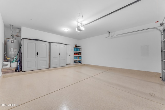 14200 W Village Pkwy Unit 2128, Litchfield Park, AZ 85340 - garage with water heater and a garage door opener