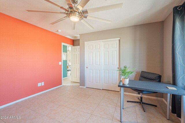 office with ceiling fan and light tile patterned floors