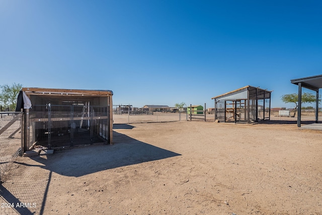 view of jungle gym with an outbuilding