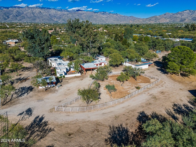 birds eye view of property featuring a mountain view