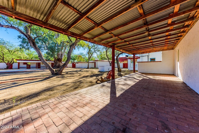 view of patio with a shed