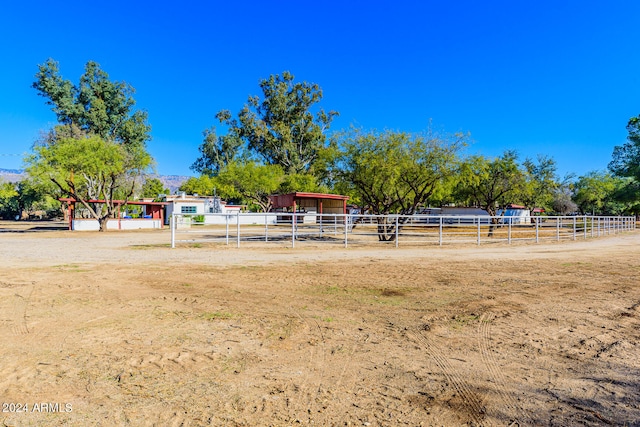 view of community with a rural view