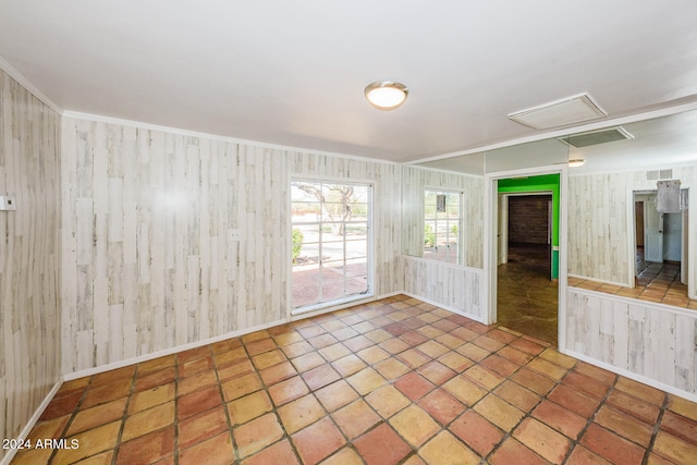 empty room with wood walls