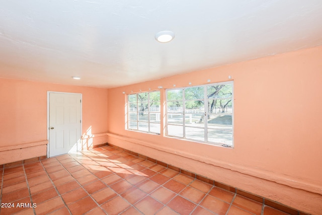 empty room featuring tile patterned flooring