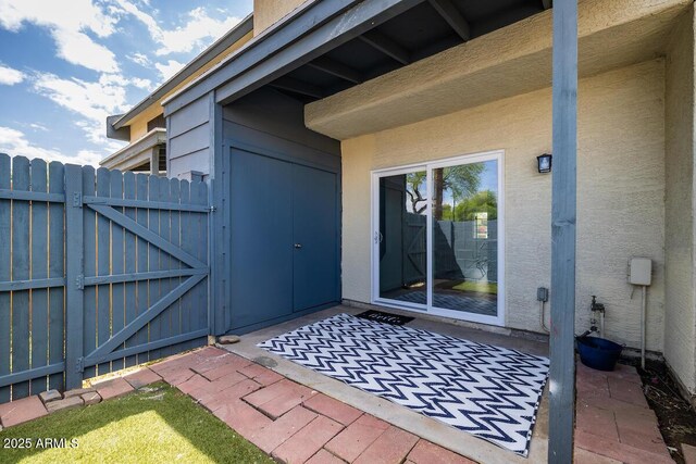 7801 N 44th Dr Unit 1003, Glendale, AZ 85301 - doorway to property with a gate and a patio