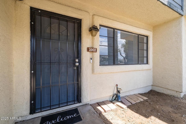 7801 N 44th Dr Unit 1003, Glendale, AZ 85301 - doorway to property featuring stucco siding