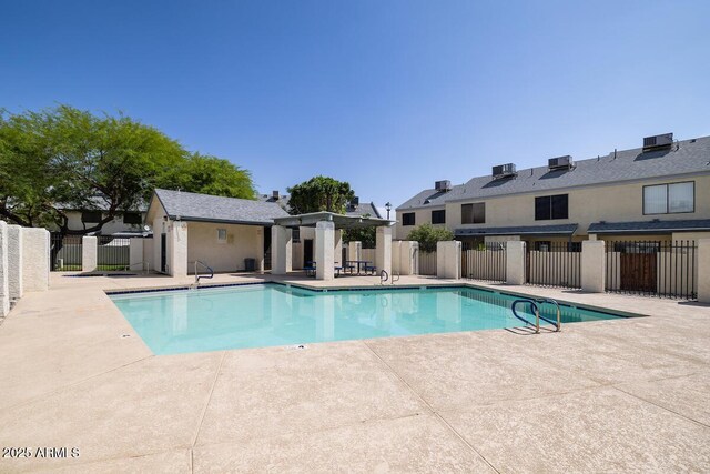 7801 N 44th Dr Unit 1003, Glendale, AZ 85301 - community pool featuring a patio